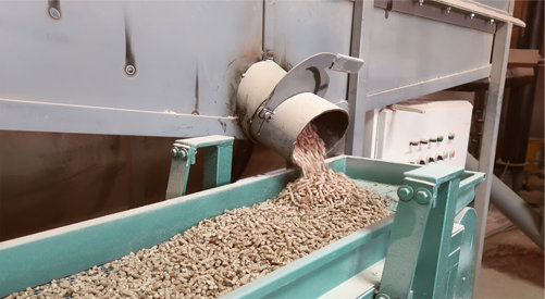 Pellet crusher in an outdoor factory