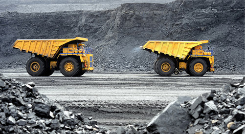 Mining trucks in mines.